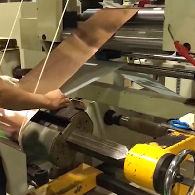 Máy tự động dán màng phim và cuộn giấy bạc đồng